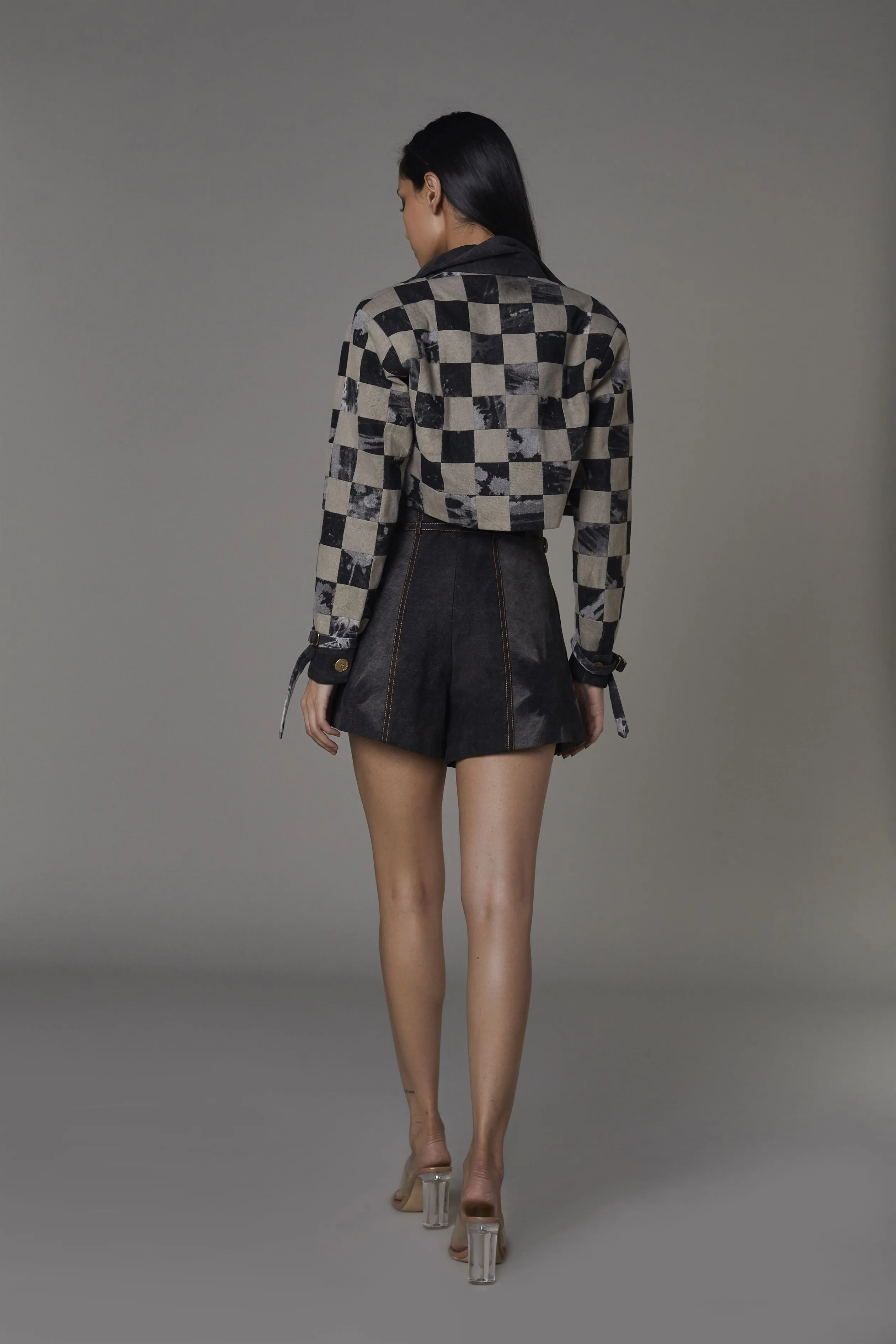 Saaksha & KinniÂ    I   Marble checked crop jacket  Black denim bustier  Black denim shorts Drill Jacket - Grey / Black / Stone  Bustier - Grey  Shorts  - Grey   SS22018    SS22006    SS22019